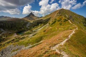 Path throught west Tatra Mountains with view on Volovec and Ostry Rochac. photo