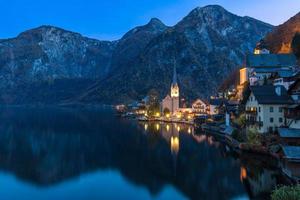 Hallstatt mountain village at night from classic postcard viewpoint Salzkammergut Austria photo