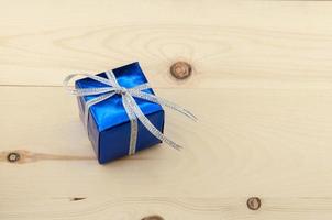 Gift boxes on a wooden floor photo