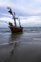 fishing boat used as a vehicle for finding fish in the sea. photo