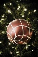 Christmas ball hanging on tree. photo