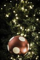 Christmas ball hanging on tree. photo