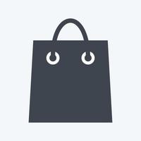 Shopping Bag Icon in trendy glyph style isolated on soft blue background vector