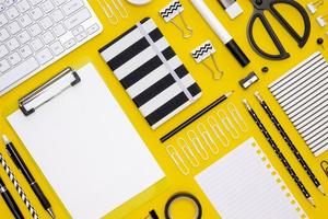 flat lay office stationery with pencils keyboard