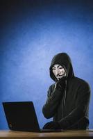 hacker with anonymous mask photo