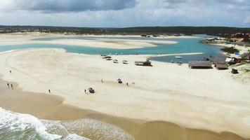Aerial footage of a drone slowly passing over natural pools of turquoise water video