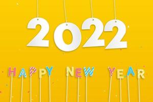 Numbers 2022 hanging on the ropes in yellow background with colorful happy new year text vector