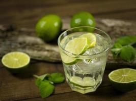 Mineral water with lime. photo