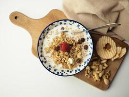 Oatmeal with milk and fruit photo