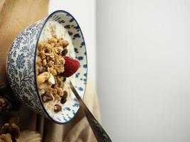 Oatmeal with milk and fruit photo