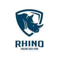 rhinoceros head shield logo design vector