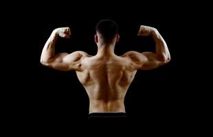 bodybuilder back over black photo