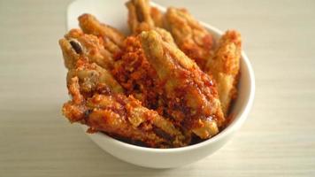 fried barbecue chicken wings in white bowl video