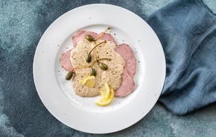 Vitello tonnato - cold, sliced veal photo