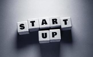 Start Up Word with Wooden Cubes photo