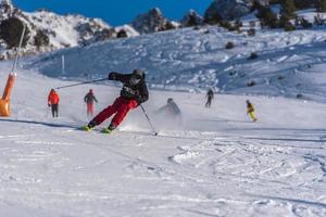 Grandvalira, Andorra . 2021 december 11 Young man skiing in the Pyrenees at the Grandvalira ski resort in Andorra in Covid19 time