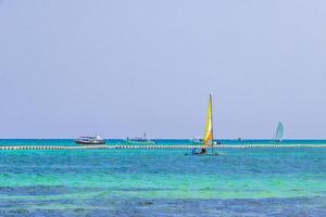 Boats yachts between Cozumel island and Playa del Carmen Mexico. photo