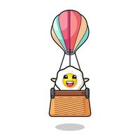 fried egg mascot riding a hot air balloon vector