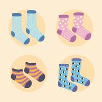 Cuatro divertidos iconos de calcetines vector