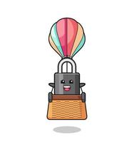 padlock mascot riding a hot air balloon vector