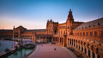 Seville, Spain - February 20th, 2020 - Spain Square Plaza Espana in Seville, the capital of Andalusia. One of the symbols of the city and a popular landmark. photo