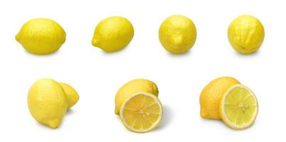 Collection of lemons isolated on white background With clipping path.half sliced lemons and chopped lemon. photo