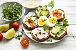 Sandwiches with healthy vegetables and micro greens photo