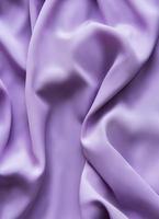 Beautiful smooth elegant  violet purple satin silk,  fabric texture, abstract background photo