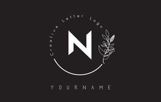 Creative initial letter N logo with lettering circle hand drawn flower element and leaf. vector