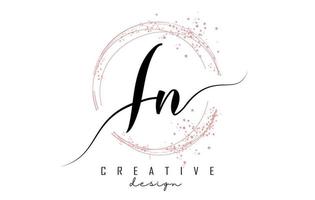 Handwritten IN I N letter logo with sparkling circles with pink glitter. vector