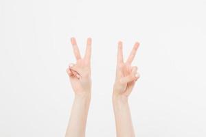 Two Hand showing the sign of victory or peace closeup isolated on white background.Front view. Mock up. Copy space. Template. Blank. photo