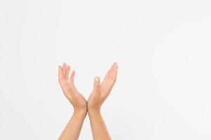 female hands measuring invisible items, woman's palm making gesture while showing small amount of something on white isolated background, side view, close-up, cutout, copy space photo