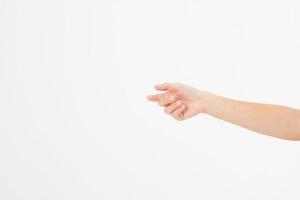 female hand holding invisible items, woman's palm making gesture while showing small amount of something on white isolated background, side view, close-up, cutout, copy space photo