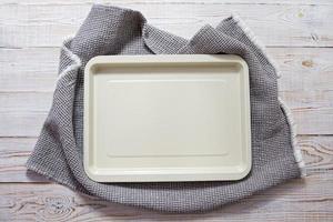 Empty food board close up, empty tray on table top view photo