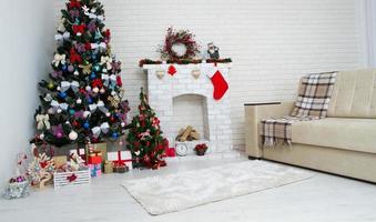 Christmas living room with a christmas tree and presents under it - modern classic style, new year concept photo