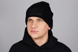 mock up - teen man in empty black hat isolated photo