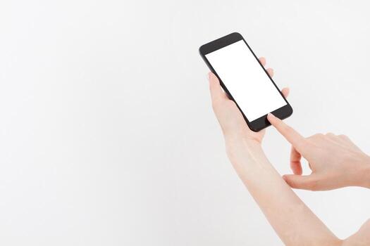 hand hold black phone. Cellular isolated on white clipping path inside. Top view.Mock up.Copy space.Template.Blank. photo