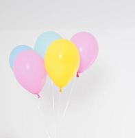 Colorful party balloons background. Isolated on white. Copy space photo