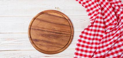 empty desk,tablecloth on wooden table top view,copy space,food and drink concept photo