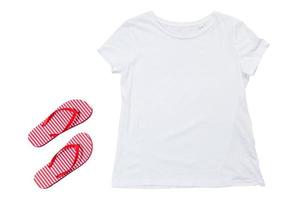 White t-shirt mock up and beach slippers isolated on white background. Tshirt empty copy space. Summer concept photo