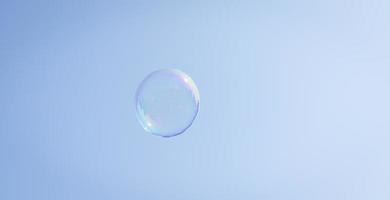 Soap bubble against the sky photo