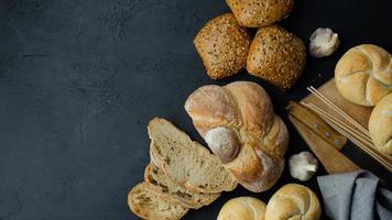 Fresh bread on dark background photo