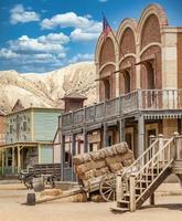 Vintage Far West town with saloon. Old wooden architecture in Wild West. photo