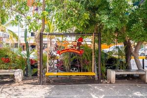 Creative advertisement sign and logo of ice cream shop on swing photo