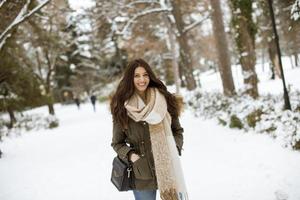 Young woman in winter day photo