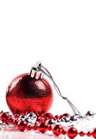 Christmas balls with ornaments on white background. photo