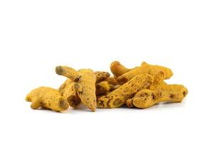 Dry Turmeric roots or barks isolated on white background photo