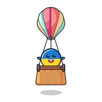ukraine flag mascot riding a hot air balloon vector