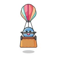 mascota de la bandera de botswana montando un globo aerostático vector