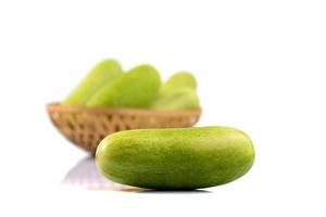 Fresh cucumbers isolated on white background photo